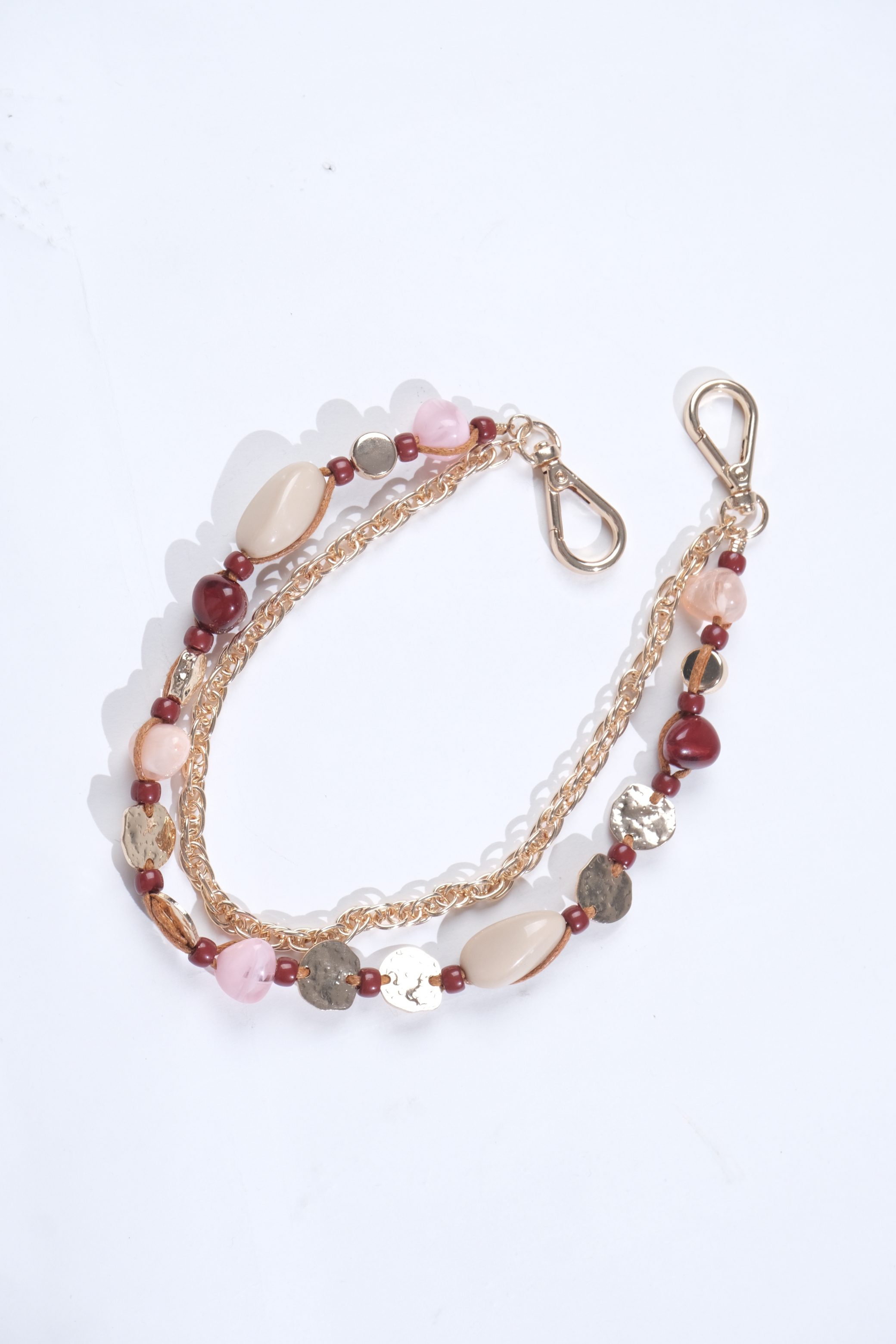 Beaded bag chain with gold-tone details