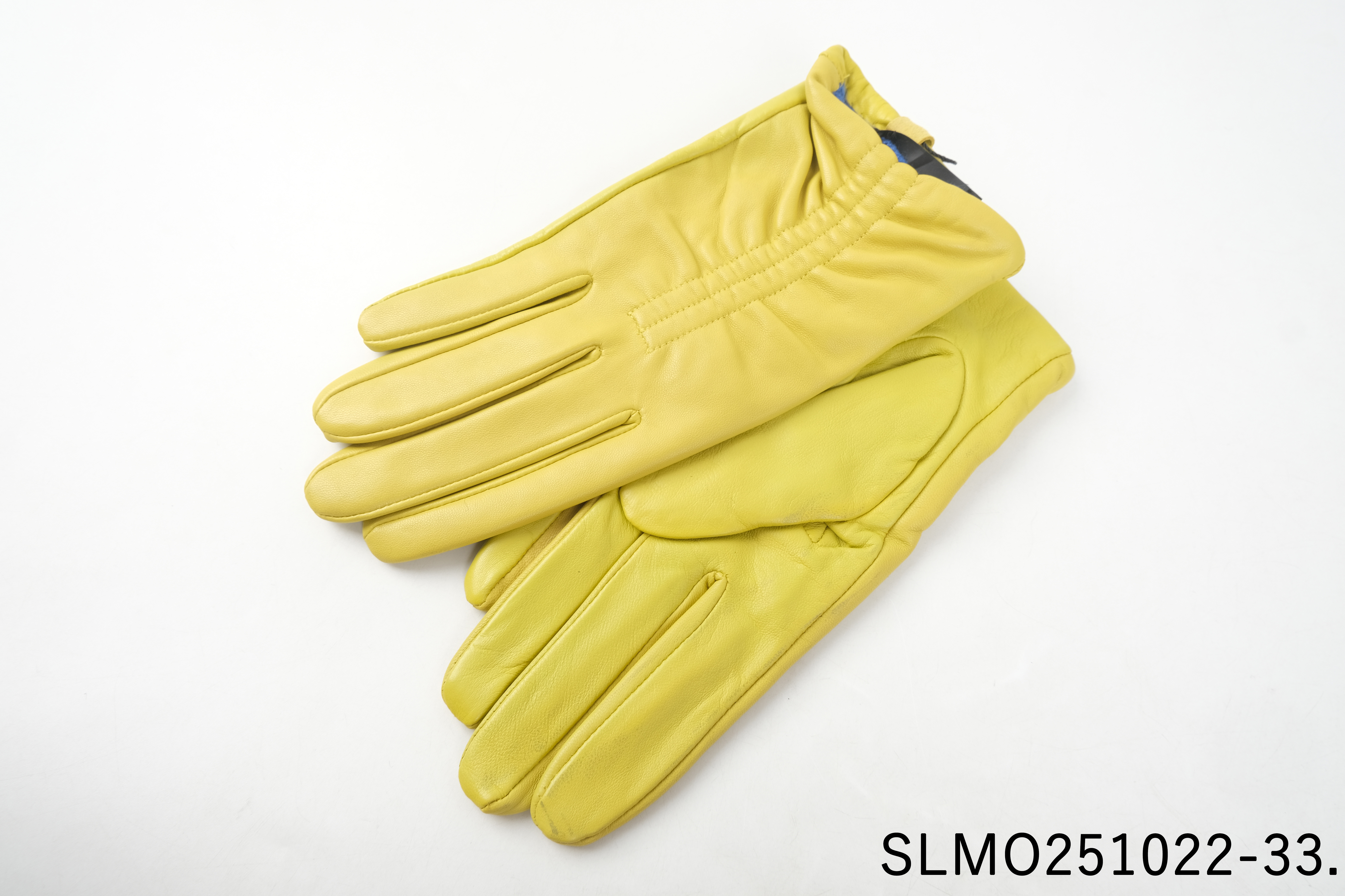 Short yellow leather winter gloves